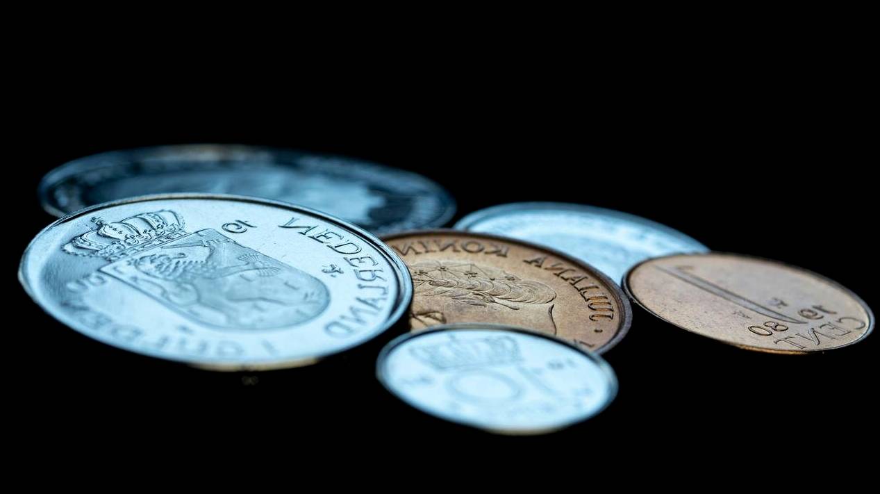 Hands holding phone with finance app